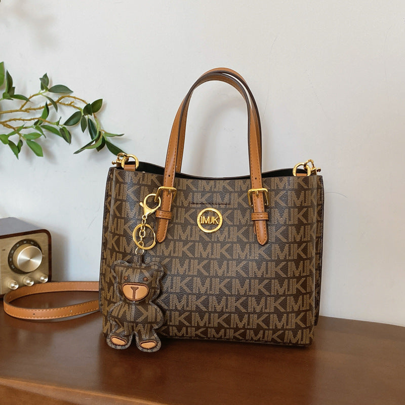 Large capacity Boston bag for women; fashionable handbag with pillow design; new style for 2025.